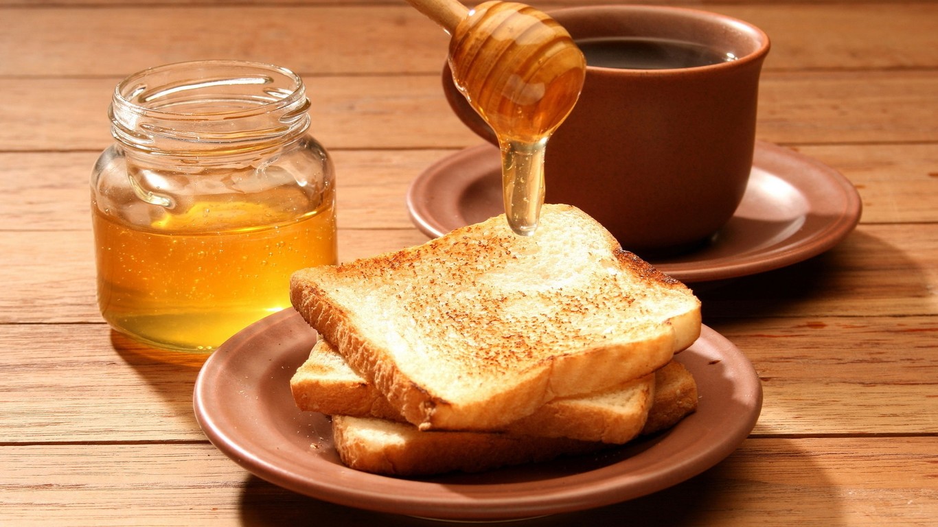 sử dụng mật ong trước khi ăn giúp điều tiết axit dạ dày